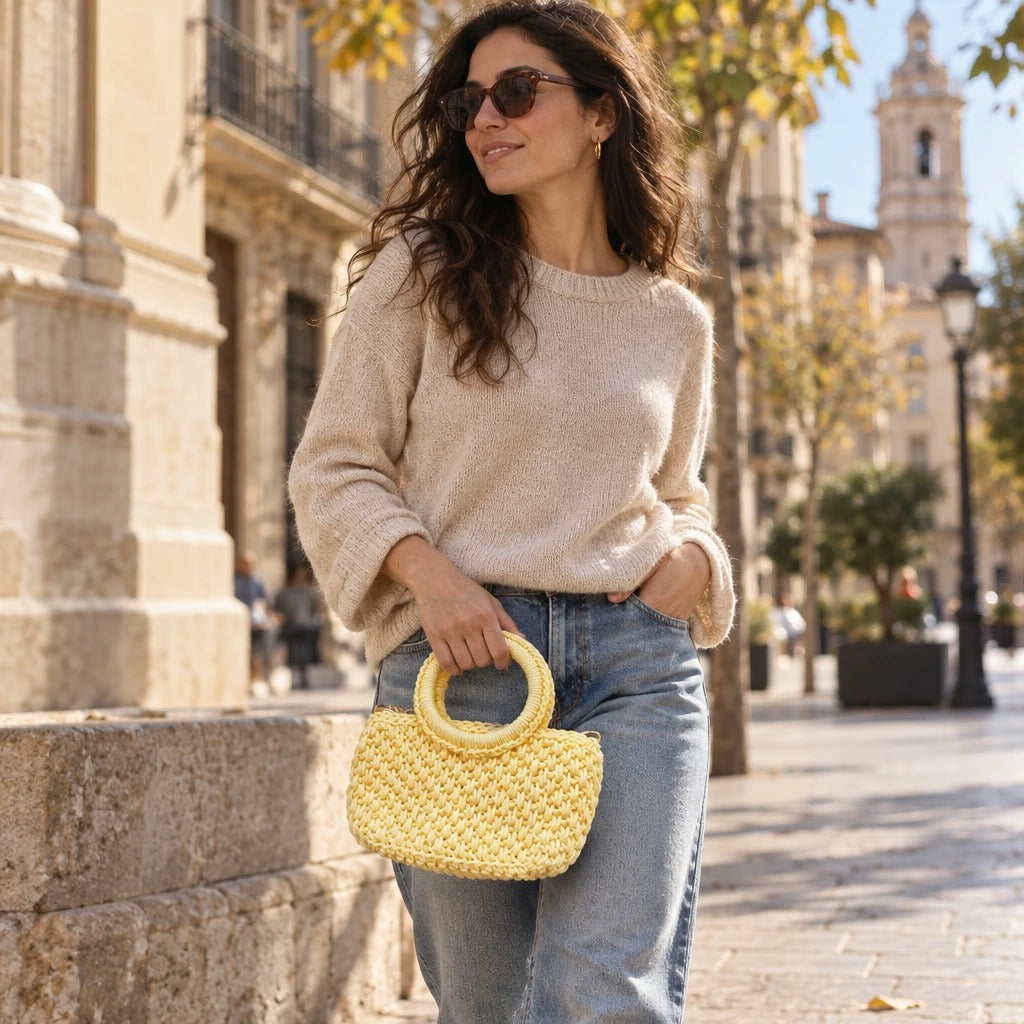 Bolso de Mano Agadir Mini | Create an ultra-photorealistic commercial photograph featuring the uploaded Bolso de Mano Agadir Mini in the provided image as the hero product.
