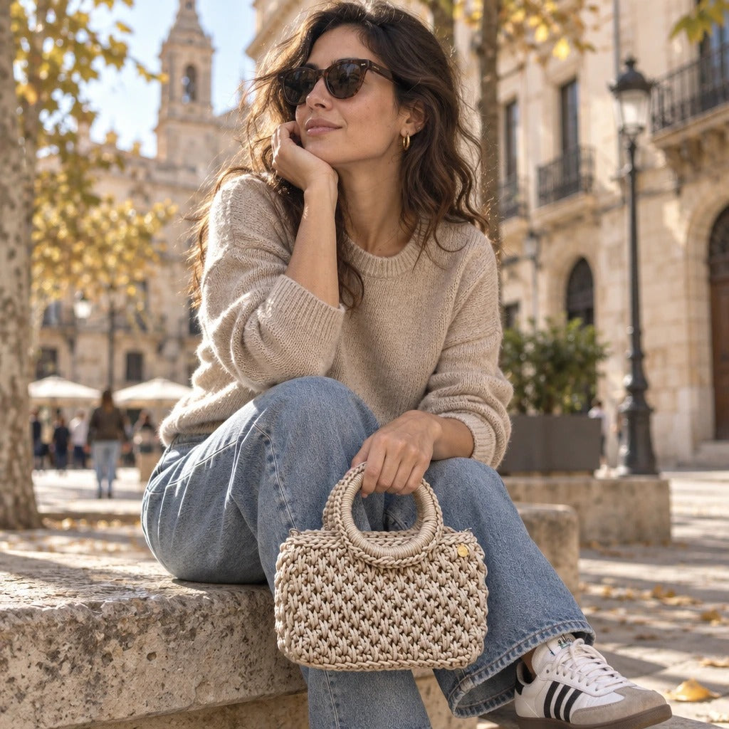 Bolso de Mano Agadir Mini | Create an ultra-photorealistic commercial photograph featuring the uploaded Bolso de Mano Agadir Mini in the provided image as the hero product.