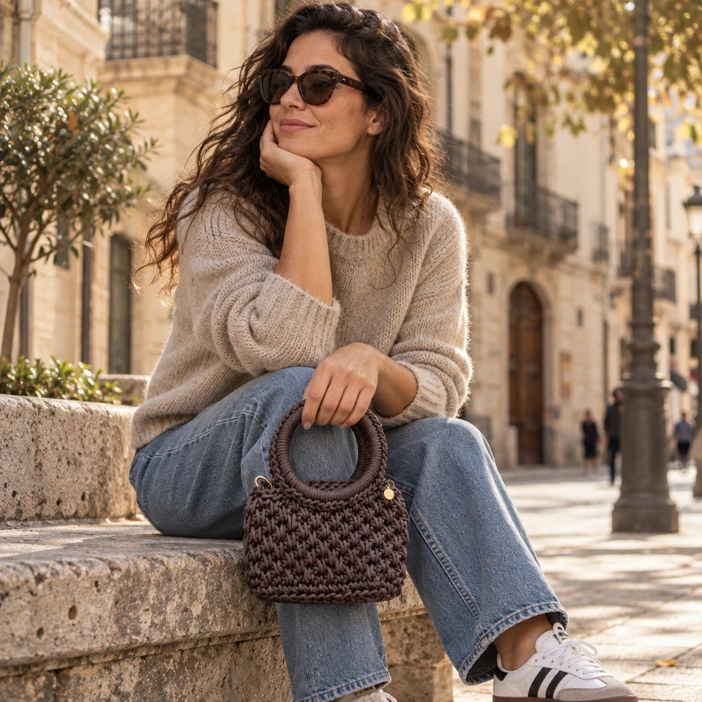 Bolso de Mano Agadir Mini | Create an ultra-photorealistic commercial photograph featuring the uploaded Bolso de Mano Agadir Mini in the provided image as the hero product.