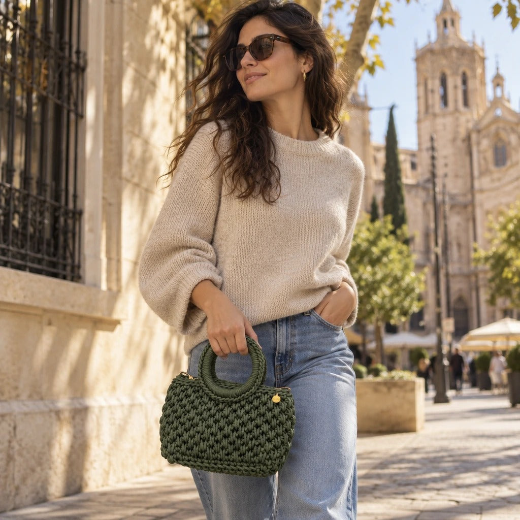 Bolso de Mano Agadir Mini | Create an ultra-photorealistic commercial photograph featuring the uploaded Bolso de Mano Agadir Mini in the provided image as the hero product.