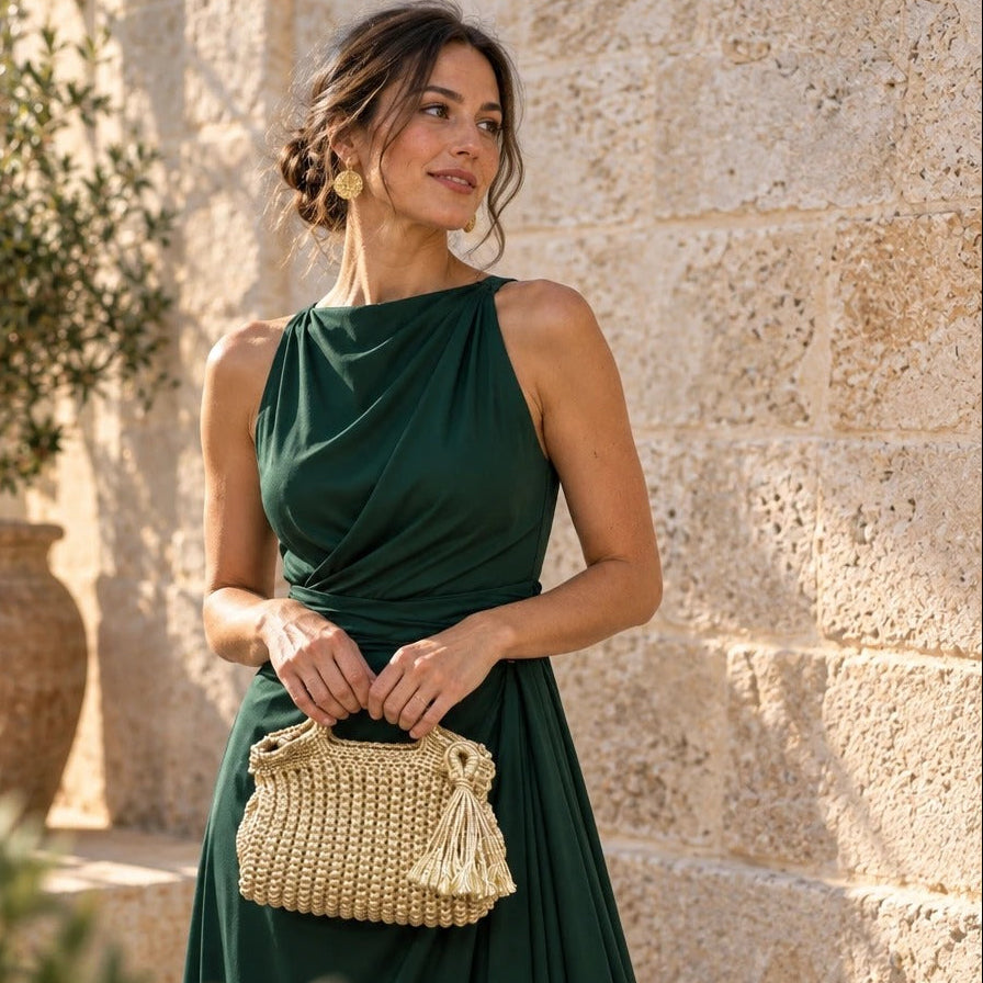 Bolso de Mano Nador Metalizado | Create an ultra-photorealistic lifestyle photograph centering the uploaded Bolso de Mano Agadir Mini Metalizado in the provided image as the only source of trut